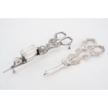 A pair of 19th Century electroplate candle snuffers and a similar pair of grape scissors