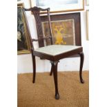 An Edwardian mahogany bedroom chair