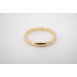 An 18ct gold wedding band, 2.8g