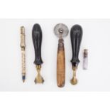 Two 19th Century parchment rollers, a Ridgely roller, small glass ink phial and a late 19th /
