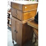 A late 19th / early 20th Century oak gramophone cabinet, modified and now fitted with a later record