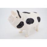 A pig figurine, 32 x 19 cm high