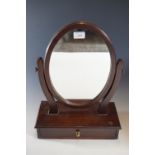 A contemporary mahogany toilet mirror, 49 cm high