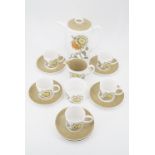 A Susie Cooper 'Sunflower' pattern coffee set, No. C 2002