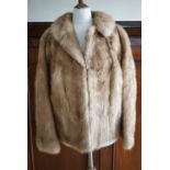 A vintage fur swing jacket, with Peter Pan collar and bracelet length sleeves, 22" across the back