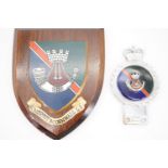 A Somerset and Cornwall Light Infantry car bumper badge by Gaunt, together with a related wall