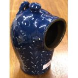 A Wetheriggs / Schofield pottery salt pig, blue glazed and slip decorated, 23 cm