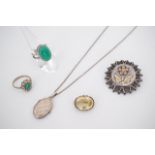 Victorian and later white metal jewellery, including a boss form brooch decorated with a tri-