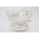 An early 19th Century tea service, comprising teapot, sucrier, milk jug, slop bowl, ten tea cups,