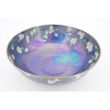 An early 20th Century Royal Doulton enamelled lustre bowl, 24 cm