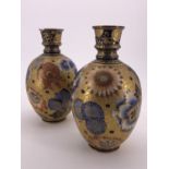 A pair of Victorian Derby porcelain oviform vases, 19 cm (one a/f)