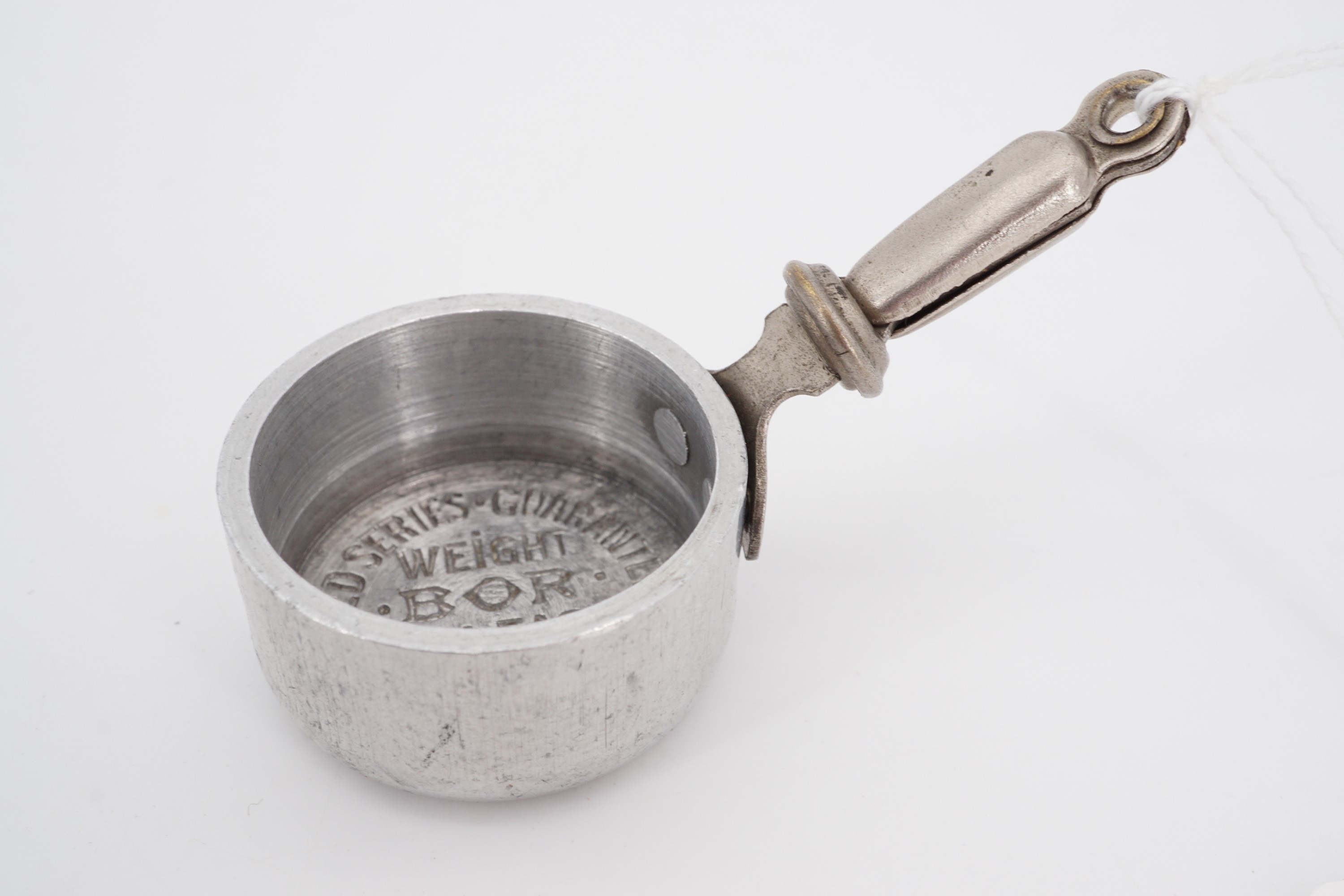 An early 20th Century salesman's miniature sample aluminium cooking pan, 4 cm diameter - Image 2 of 2