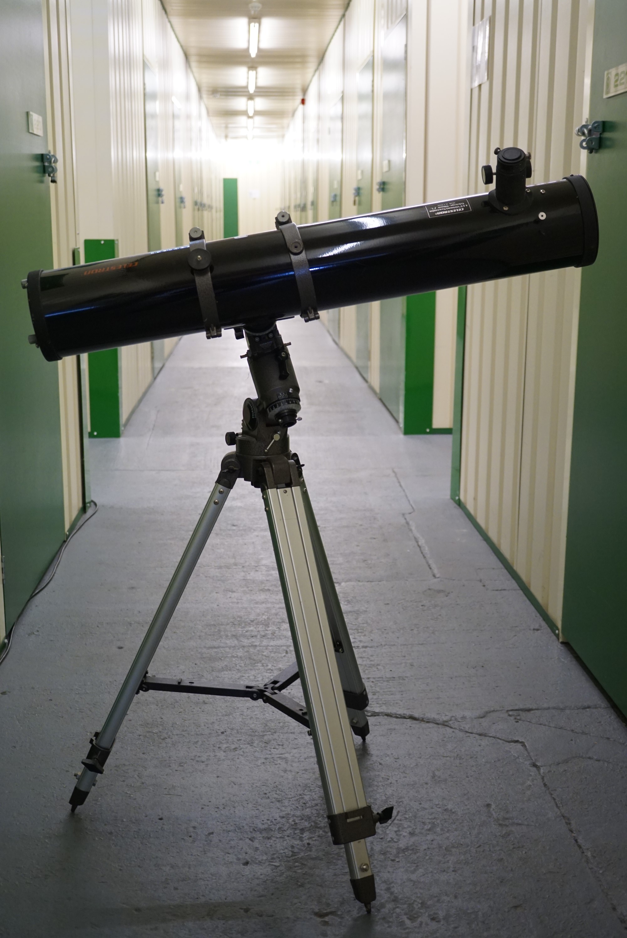 A Celestron 4.5inch astronomical reflector telescope on equatorial