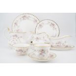 A large quantity of Royal Albert 'Victoriana Rose' tea and dinner wares, approximately seventy-