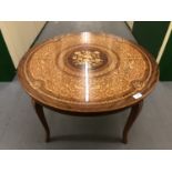 A late 20th Century Italian profusely-inlaid coffee table, 78 cm x 48 cm