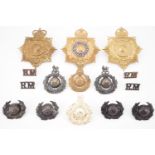 Royal Marines helmets plates and other badges