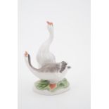 A Russian Lomonosov porcelain figurine modelled as two geese