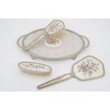 A vintage dressing table set, mirror, tray and two brushes