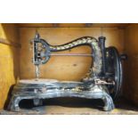 A Victorian Jones "catback" sewing machine