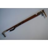 A Victorian stag horn mounted Malacca walking cane / riding crop, having an electroplate collar