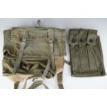 A Vietnam period US Marine Corps field pack and a US Army webbing magazine pouch