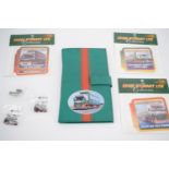 Official Eddie Stobart merchandise including pin badges, stickers and a wallet with note pad and