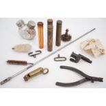 A quantity of military gun parts and tools including oil bottles, a Bren machine gun fouling tool