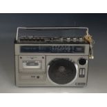 A 1980s Hitachi portable radio-cassette player
