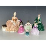 Royal Doulton comprising A Lady from Williamsburg, Reverie, Sarah, Christmas Wishes and two Coalport