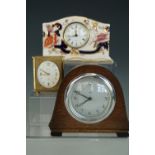 A Mason's Mandalay clock, a small mid-20th Century Smith's oak cased clock and a 1960s Swiza alarm