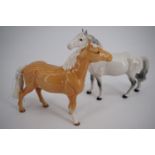 Two Beswick horses