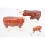 A Beswick Hereford Bull, cow and calf; "Champion of Champions"