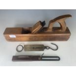 Tools comprising a Marples jack plane, Stanley rosewood sliding bevel gauge, and a Salter spring