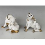 A pair of late 19th Century whimsical miniature dog figurines, 5 cm