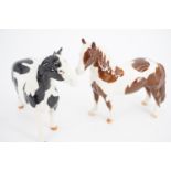 Two Beswick horses