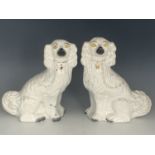 A pair of Victorian Staffordshire spaniels, 33 cm