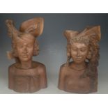 Two Balinese carved hardwood busts, 36 cm