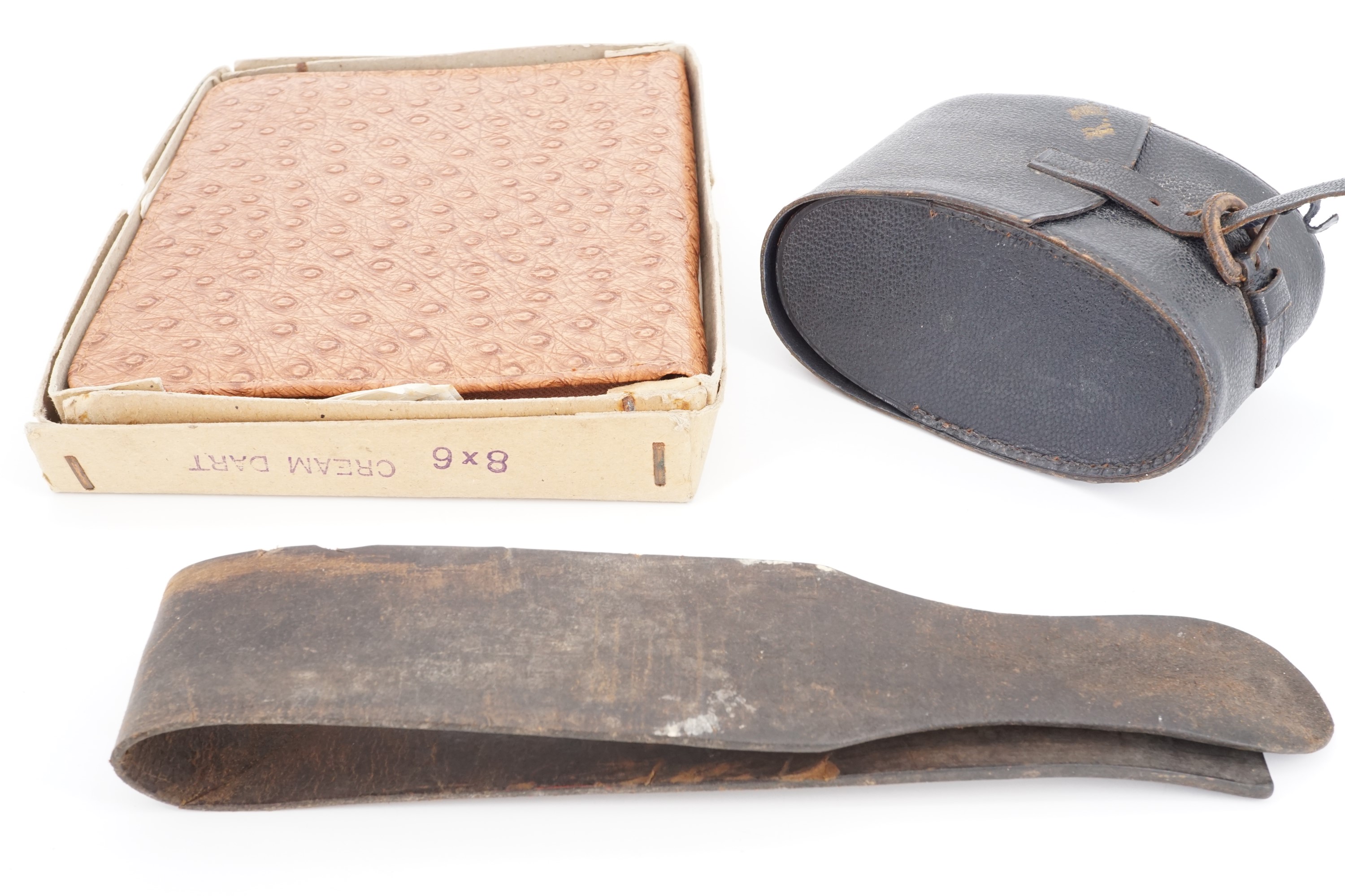 A 1950s faux reptile skin travelling writing case in original carton, together with a leather-