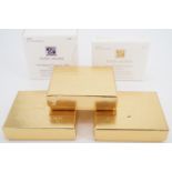 Five Estee Lauder Lucidite powder compacts in original packaging