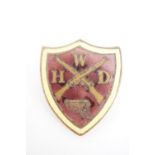 A Second World War Women's Home Defense League enamelled badge