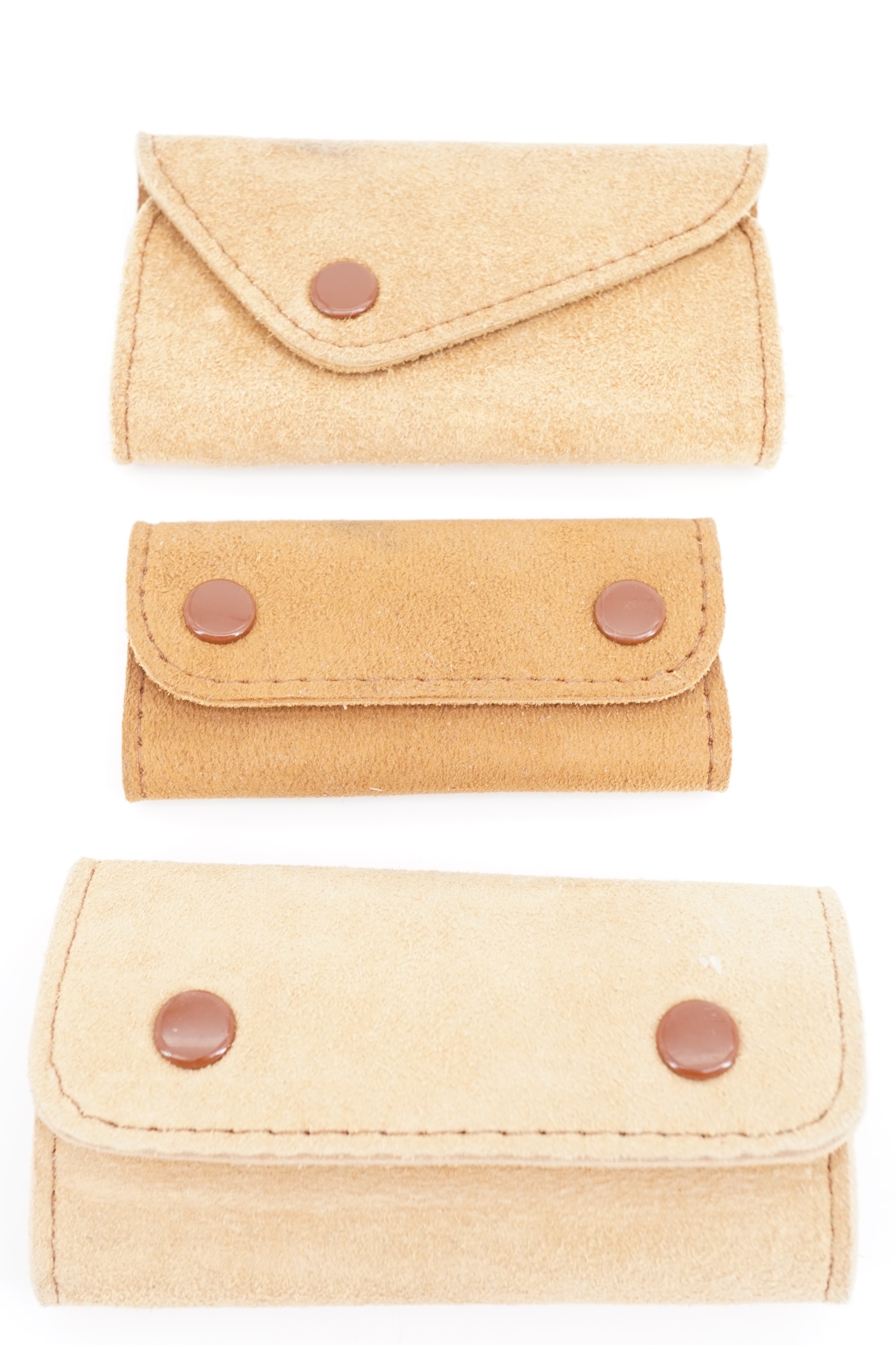 Three new-old-stock deerskin key wallets hand-crafted by Wilson of Pitlochry, Scotland