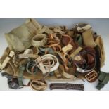 A large quantity of military and other webbing and leather accoutrements together with a Great War