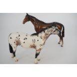 Two Beswick horses