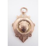 A 1914 engraved 9ct rose gold watch chain fob, 9.25 g