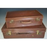 Two early 20th Century hide suitcases, largest 60 cm x 35 cm x 18 cm