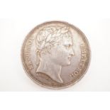 An 1809 silver Napoleon medallion bearing a profile bust after Andrieu, 32 mm