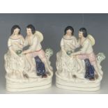 Two Victorian Staffordshire flatback figurines modelled as a young man presenting his belle with a