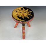 A contemporary carved and painted wooden stool, 38 cm, [UK P&P circa £20]