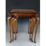 An old quality reproduction Georgian style walnut next of tables, each having slender cabriole