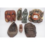 Ethnic art including a Canadian Wolf Original Inuit style figurine, an east African carved stone